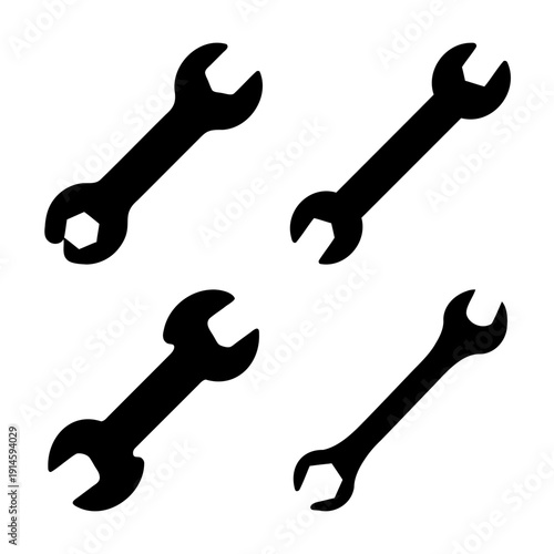 Collection of black wrench tool silhouettes for repair and maintenance tasks