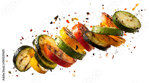 Grilled zucchini and bell pepper slices with water splash isolated on transparent background