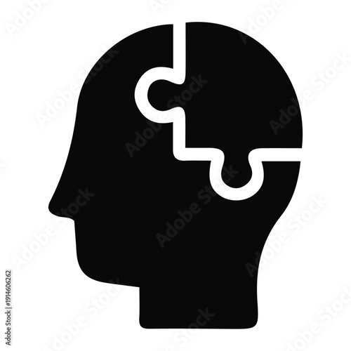Human Head Silhouette with Puzzle Piece.