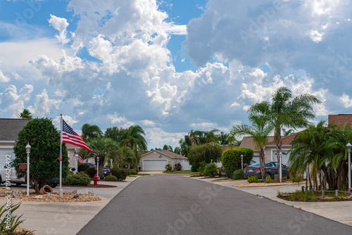 The Villages residential street and clouds.