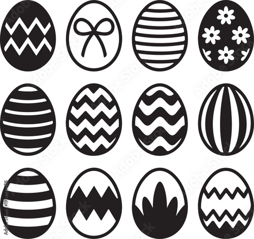 Twelve distinct black and white Easter eggs adorned with various patterns arranged neatly in rows