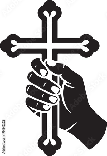 A human hand firmly grasps a black religious cross with ornate ends against a white background