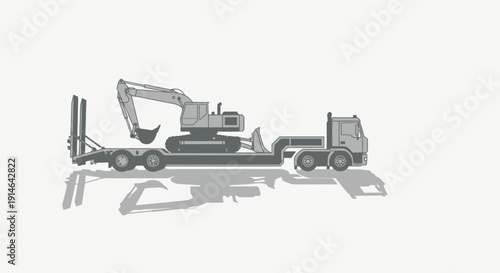 Heavy Machinery Transported Via Truck and Lowboy Trailer