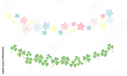 手描きの四つ葉のクローバーと花のカーブしたライン