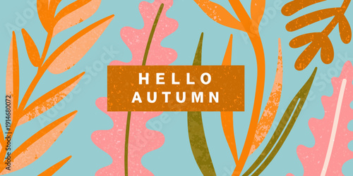 Colorful autumn leaves and a hello autumn message on a teal background