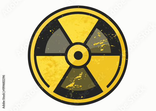 Grungy circular radiation hazard symbol with a black and gray radioactive icon on a yellow background, showing risk.