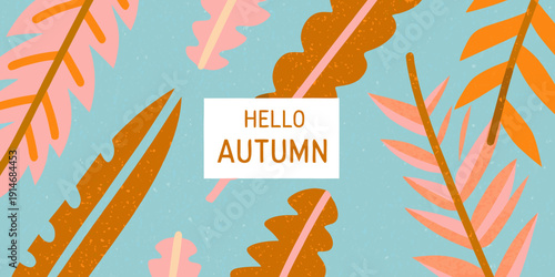 Aesthetic autumn leaves and a hello autumn greeting on a blue background