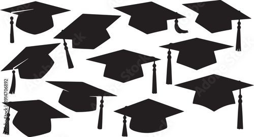 Graduation caps and tassels in black on white background