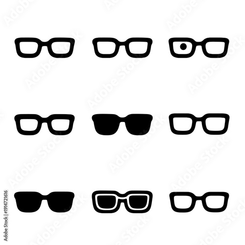 Collection of black frame glasses on gradient gray background