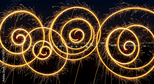Sparkling swirls of light painting create a magical festive atmosphere perfect for celebration and new year's eve designs