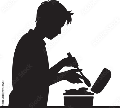 Silhouette of a boy cooking with a spatula and bowl