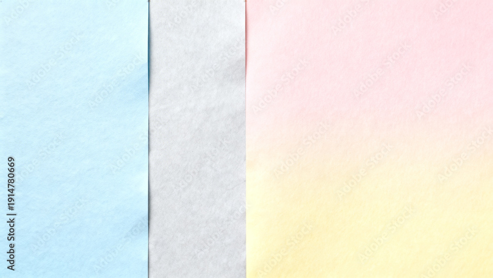 Fototapeta premium Soft pastel gradient paper in blue, grey, and pink hues