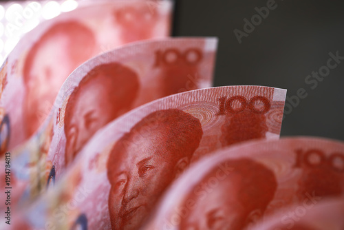 Εκτύπωση καμβά Close-Up of Chinese Yuan Banknotes Showcasing Red Currency with Mao Zedong Portr