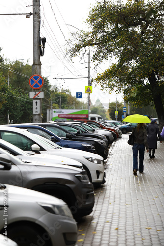 Wallpaper Mural Rainy Day Street Scene with Parked Cars and Pedestrians Holding Umbrellas Torontodigital.ca