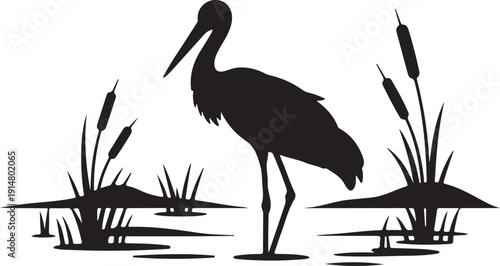 Black Silhouette of a Crane Bird in a Marsh with Reeds