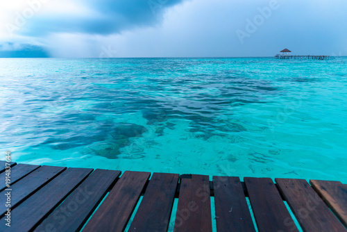 Blue sea white beach turquoise ocean wave coastal in tropical paradise landscape. Beautiful scene seascape marine coastline destinations. Tropical beautiful blue ocean lagoon lake travel summer time.