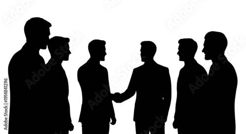 Silhouettes of business people shaking hands in a professional setting