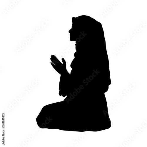 Praying muslim woman silhouette