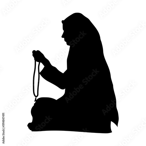 Praying muslim woman silhouette