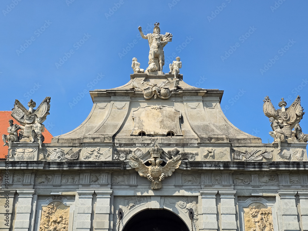 Obraz premium Alba Carolina Citadel's 3rd Gate: baroque architecture with Charles VI's equestrian statue and allegorical virtues in Alba Iulia, Romania.