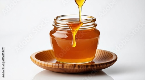 Close-up of honey pouring into a wooden bowl, with droplets around it. A warm, natural composition suitable for culinary, wellness, and eco-friendly projects.