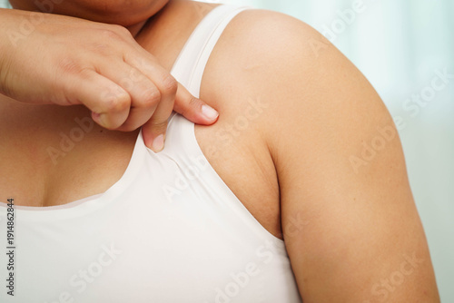 Quadro em tela Asian big size overweight woman show armpit fat body.