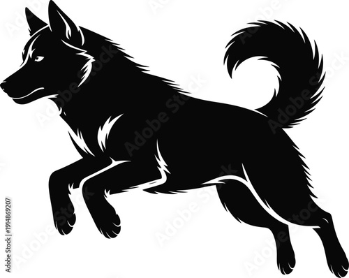 Black silhouette of a jumping dog with a bushy tail