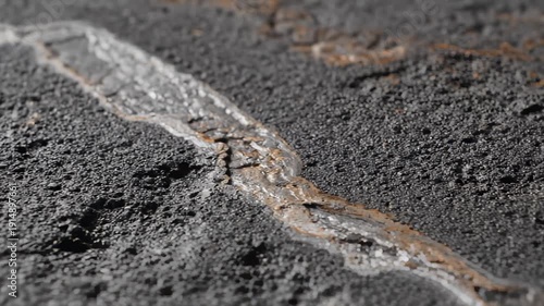 Wallpaper Mural Close-Up of Water Flowing Over Textured Dark Surface, Macro Shot Torontodigital.ca