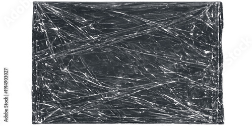 Black leather texture and background meet black and white paper in a cold abstract winter pattern of frozen frost, silver foil, and blue ice crystal nature on a textured metal surface