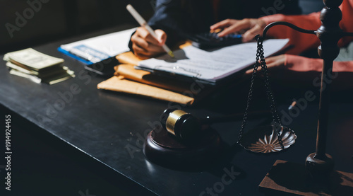 Consultation and conference of professional businesswoman and Male lawyers working and discussion having at law firm in office. Concepts of law, Judge gavel with scales of justice