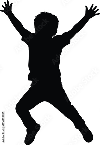 Energetic young boy jumps high with both arms stretched out in pure.