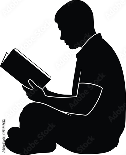 Student silhouette sitting cross-legged while intently reading a book.