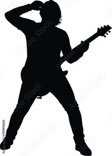 Musician silhouette playing electric guitar during energetic live.