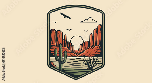 Desert landscape with saguaro cactus and canyon at sunset.