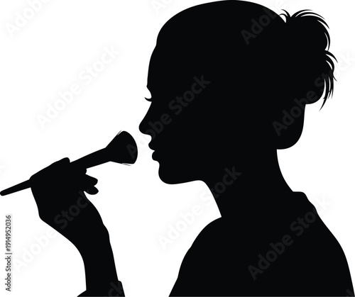 Woman's profile silhouette applying cosmetic powder with a large makeup.