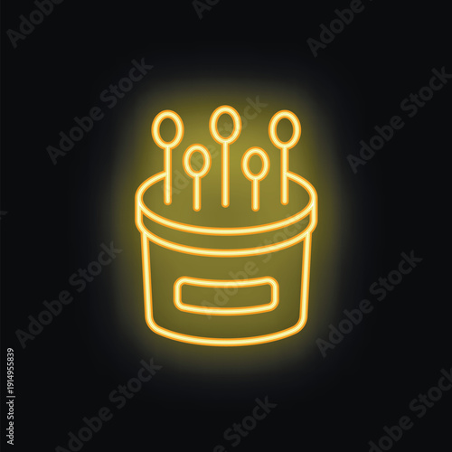 Bright yellow neon icon of a pincushion with pins sticking out