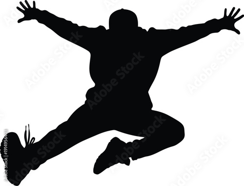 Energetic teenager silhouette jumps high with arms wide open demonstrating.