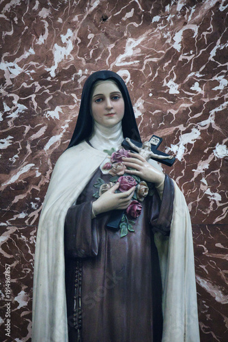 Detailed Sculpture Of St Therese Of The Child Jesus With Bouquet Of Roses
