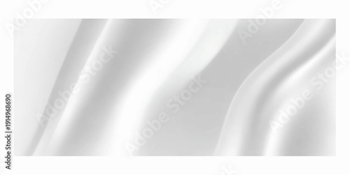 A blank white page with a subtle curl rests on a brushed silver metallic surface featuring a smooth steel texture and light gray wave pattern