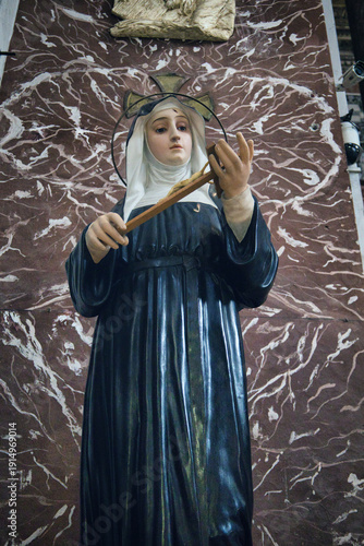 Detailed Religious Sculpture Of Saint Rita With Roses And Crucifix