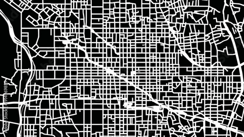 Black and white illustration of urban plan showcasing roads, water bodies, and grid layout