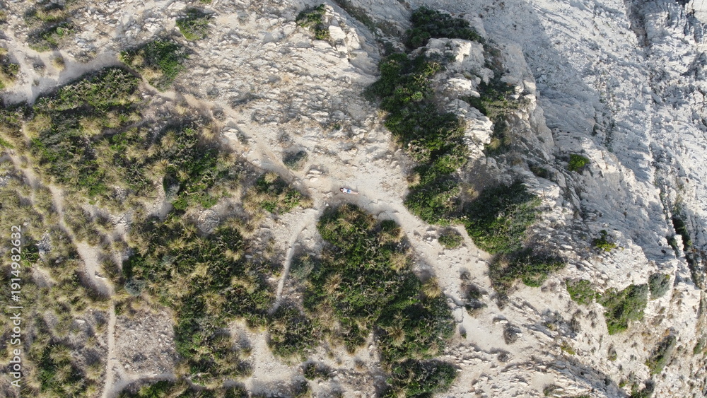 Obraz premium Dune Trails Overview. View From Above Of Winding Sandy Paths Crossing Dunes With Activity Indications