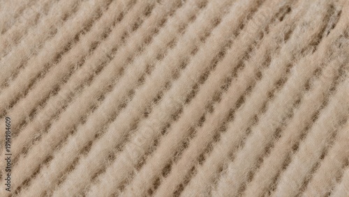 Beige and pink diagonal striped woven fabric texture background.