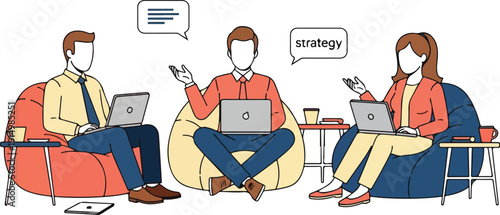 People discuss strategy with laptops in a casual meeting setting.