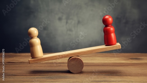 Two wooden figures balancing on a seesaw scale against a dark background