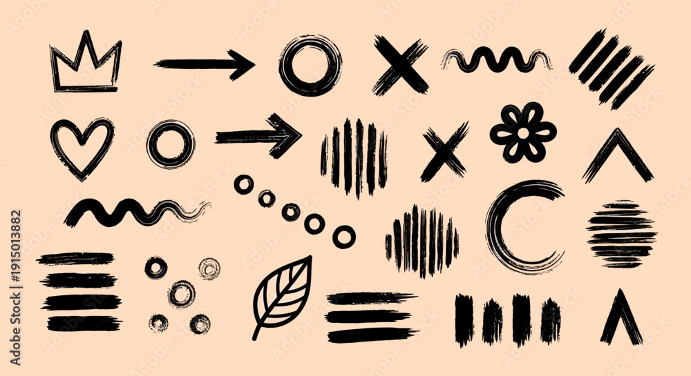 Fototapeta premium A collection of hand-drawn black brushstroke graphic elements including arrows, hearts, crowns, circles, lines, and abstract shapes on a light background.
