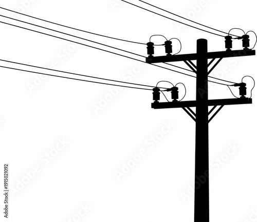 Angled perspective of utility pole silhouette with crossarms