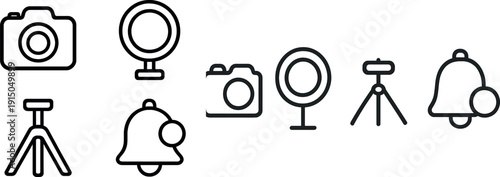 A collection of photography tools including a camera, tripod, light source, and a bell arranged neatly on a flat surface. These items are essential for taking quality photos in various settings.