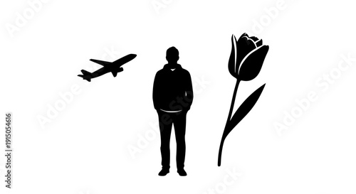 Silhouette of a person standing between a flying airplane and a tulip.