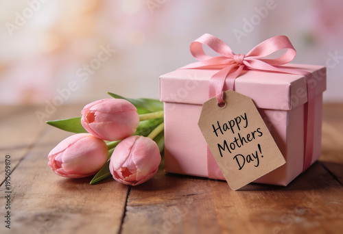 Pink gift box tied with ribbon and tulips, mothers day celebration, mom present, wooden surface wallpaper